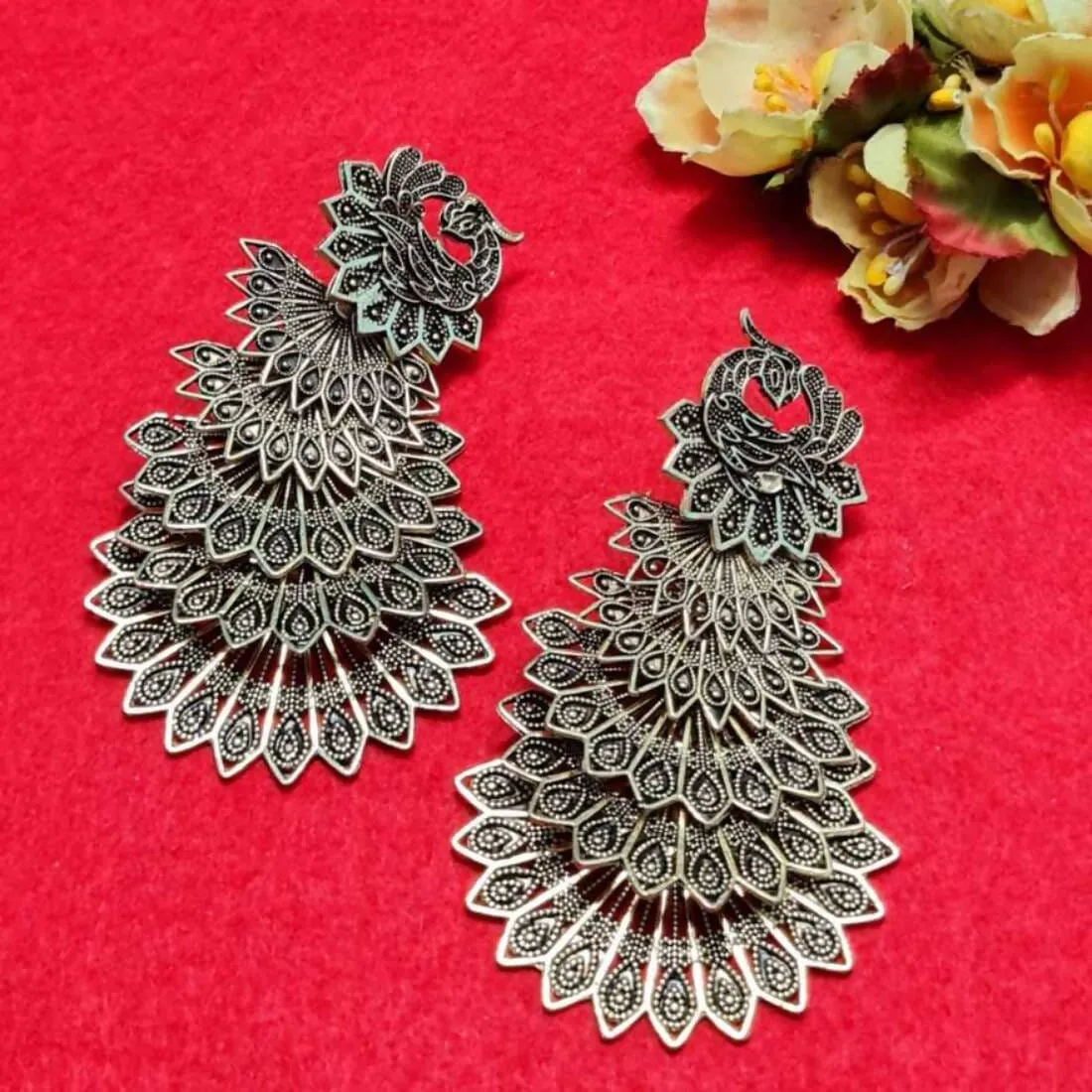 BANDISH Oxidised Silver Antique Peacock Drop Earrings