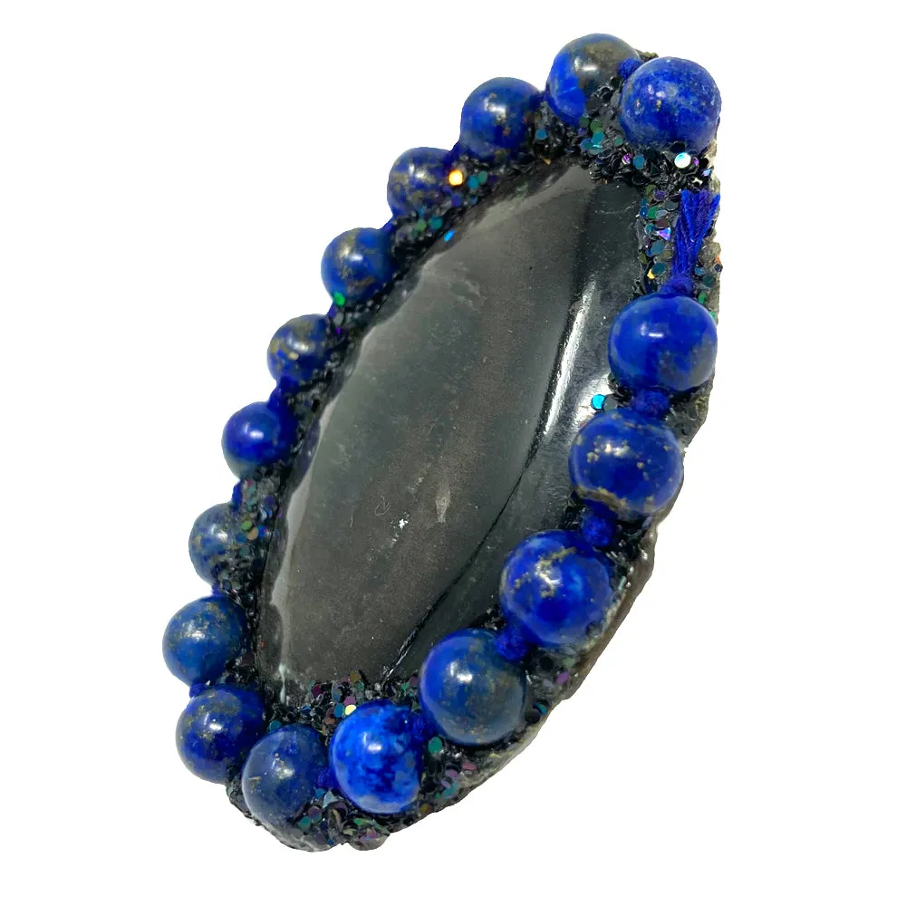 BLACK STONE RING WITH BLUE BEADS