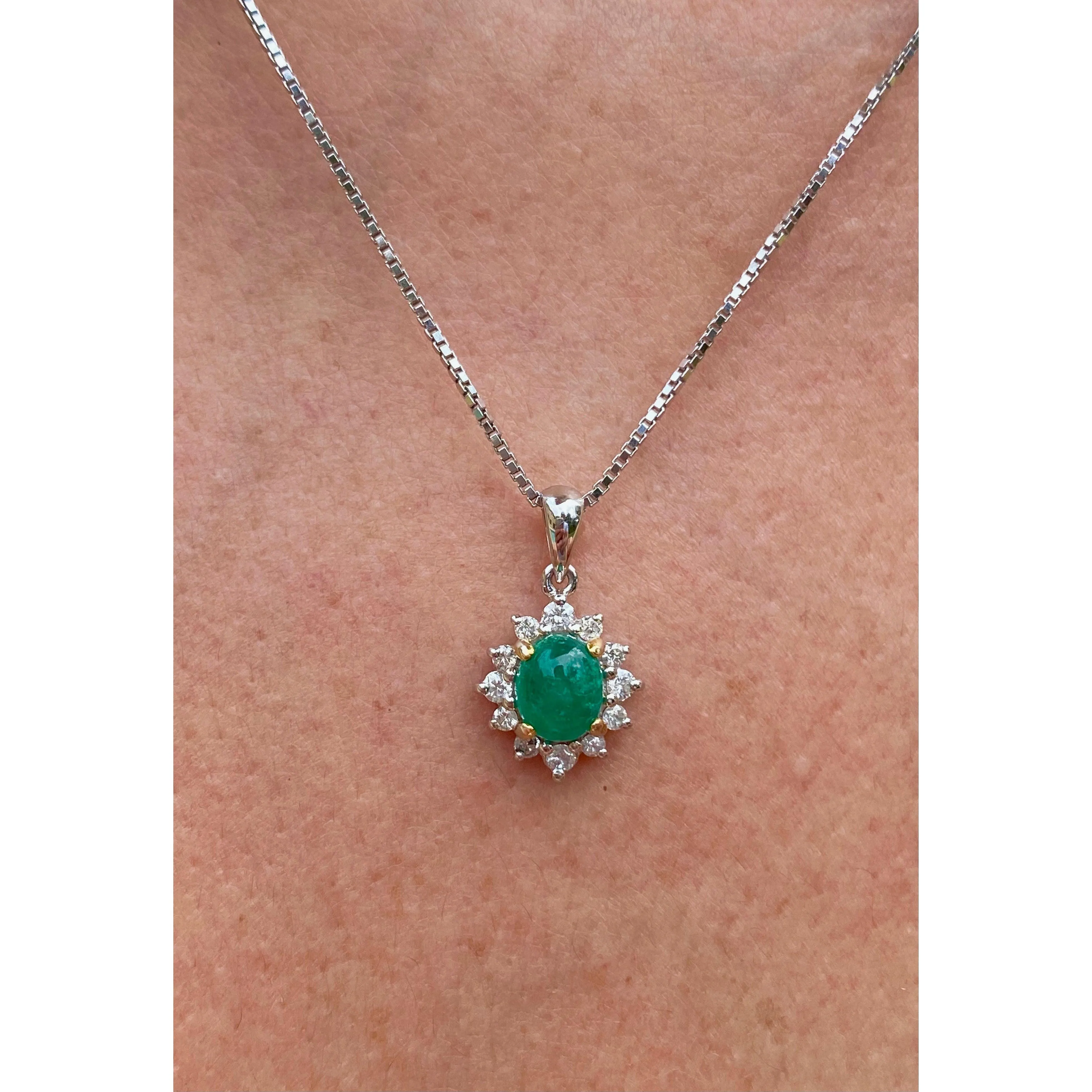 Cabochon Cut Emerald and Diamond pendant in 18k white gold floral/star design