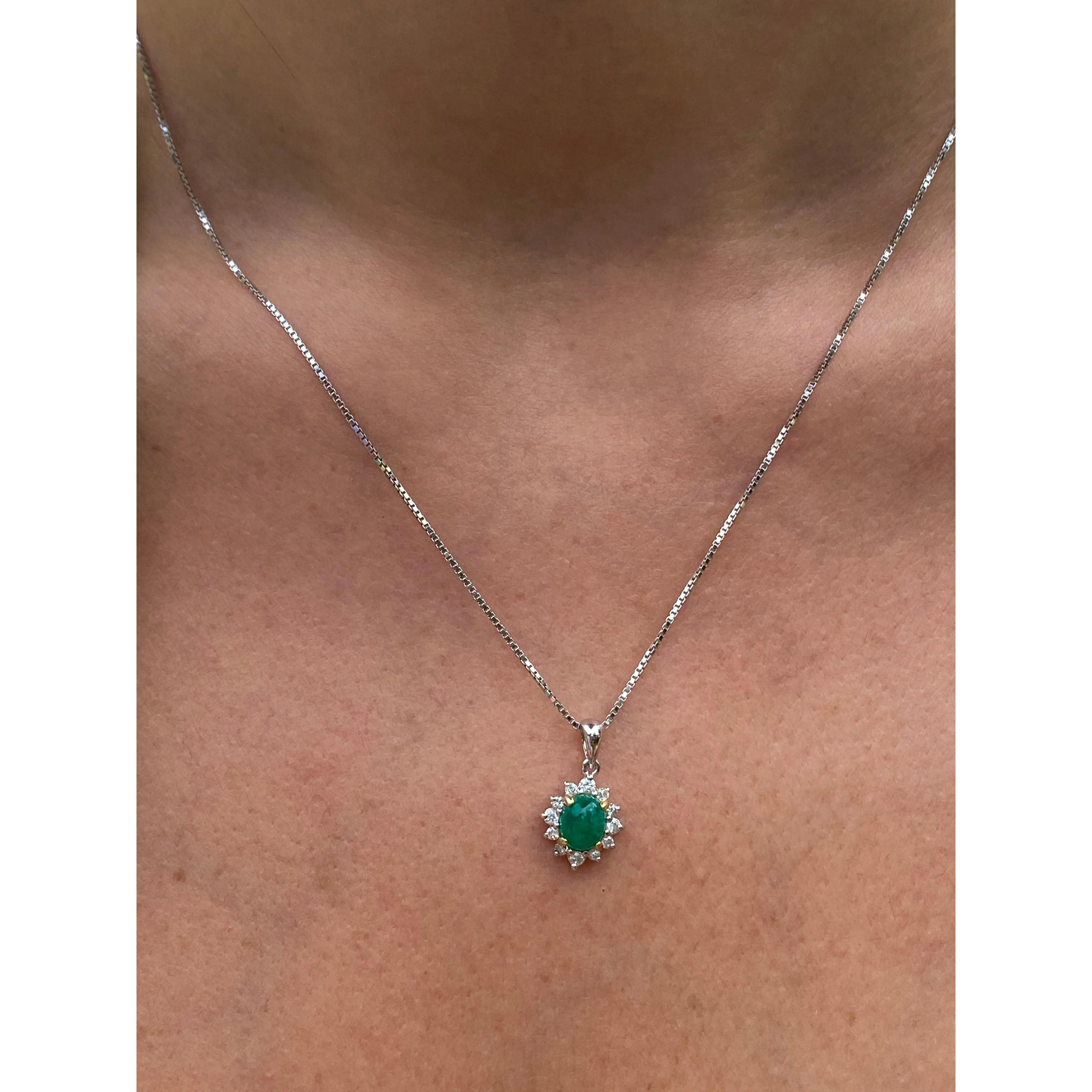 Cabochon Cut Emerald and Diamond pendant in 18k white gold floral/star design